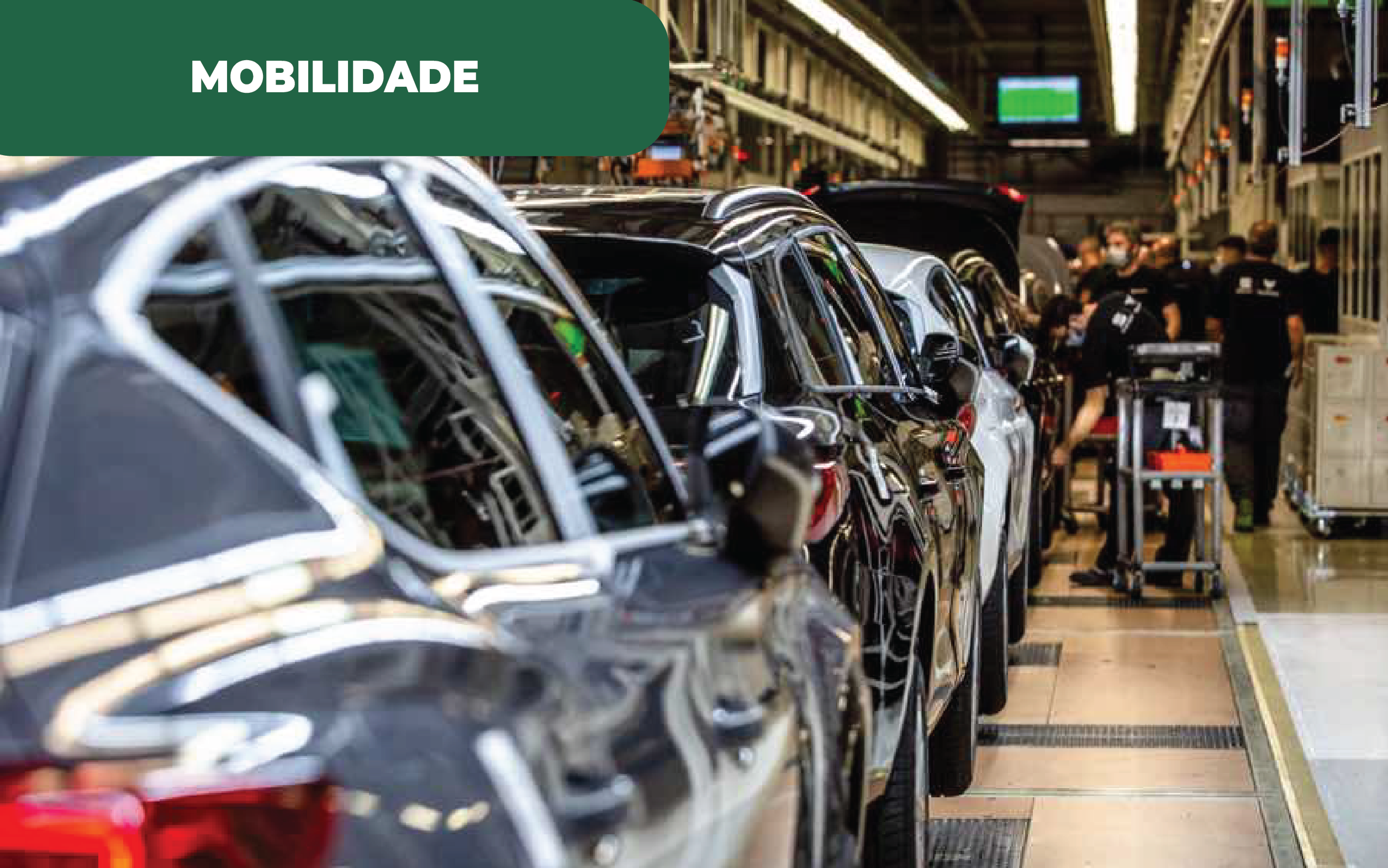 Imagem colorida de uma fila de automóveis em fabrico. No canto, destaca-se a palavra mobilidade. Alusão a revolução automóvel que entra em ação na UE